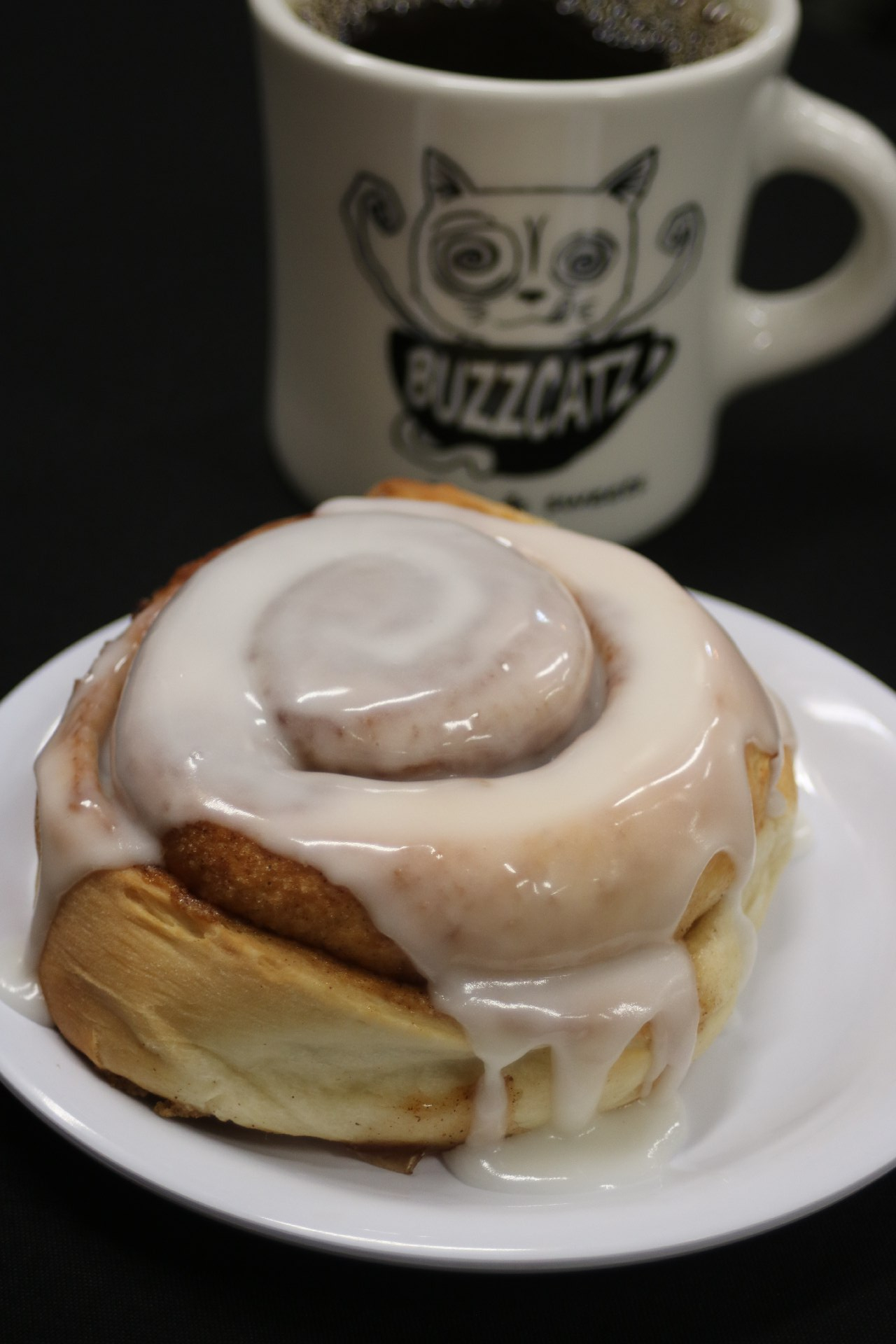 cinnamon roll and coffee